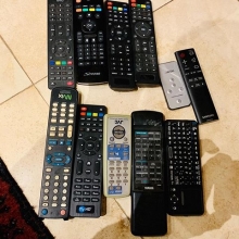 Which, pray tell, of these remotes could switch on one TV? Techno boffins have too many things! Plus we found another 4 and then BINGO the right one!